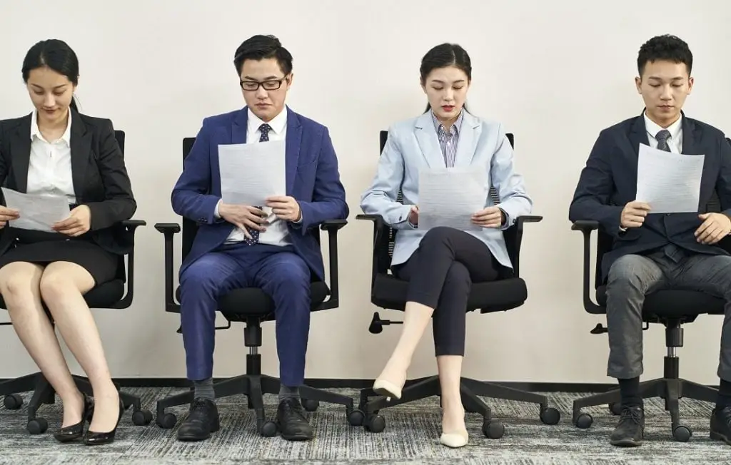 People Waiting in Line for Job Interview