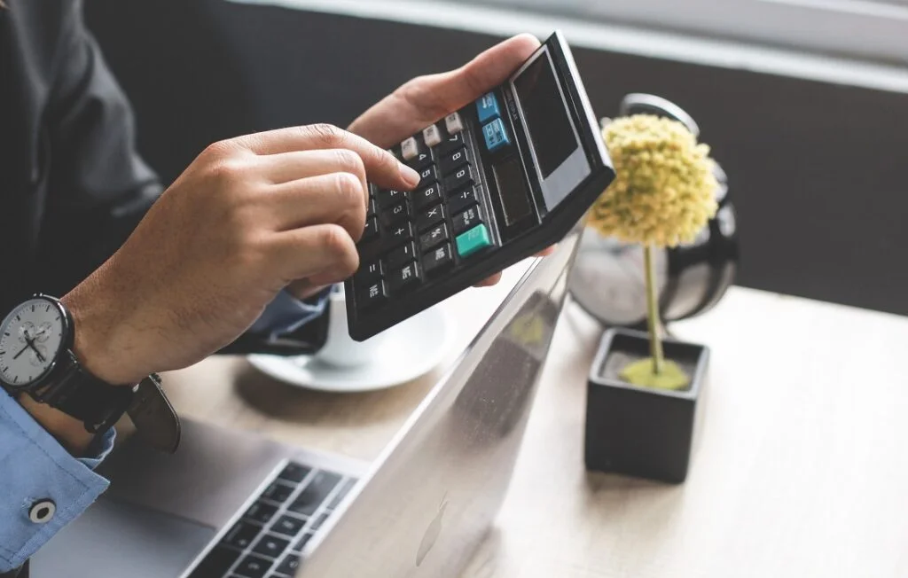 Accountant Work on Calculator