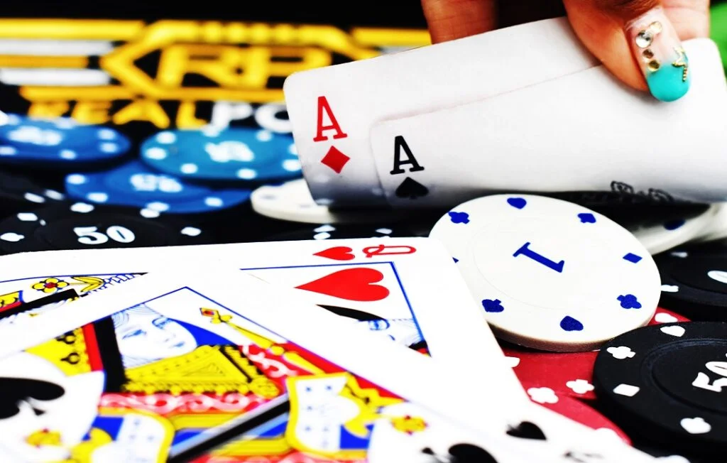 Woman plays poker in the casino